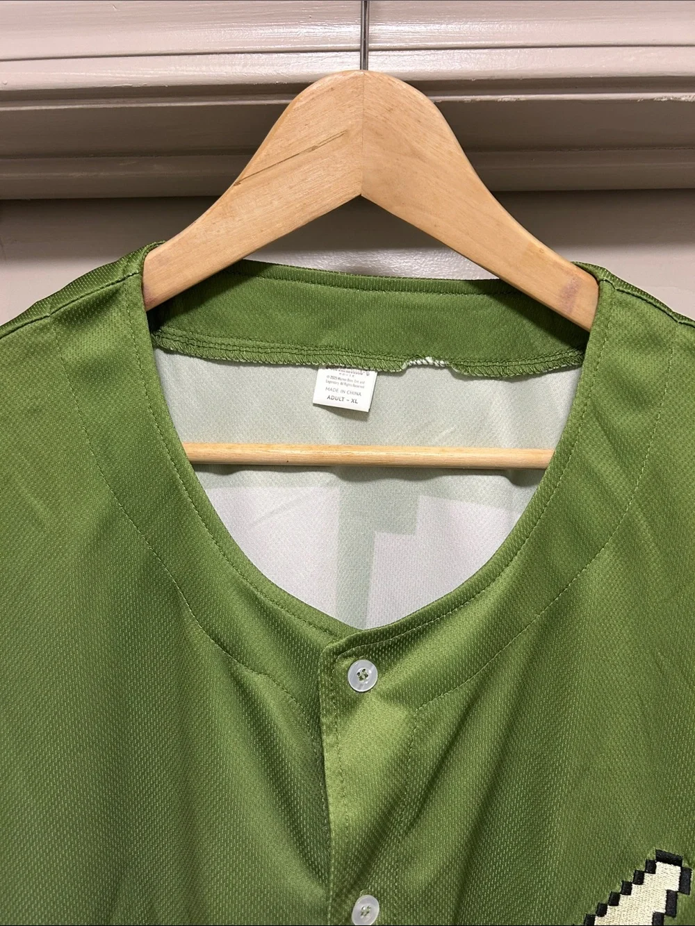 Green and White Baseball-Style Button-Up Shirt with 'A' Logo